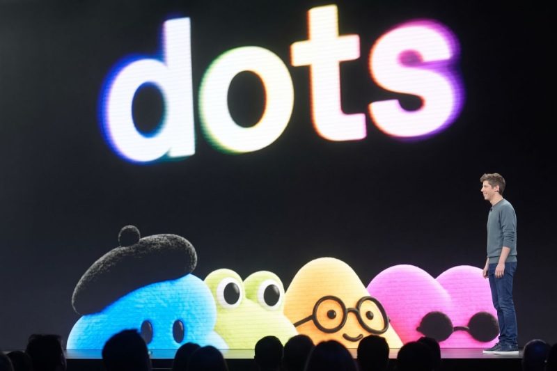 Altman presenting OpenAI Dots on stage at DevDay with colorful character avatars under a large illuminated "dots" logo.